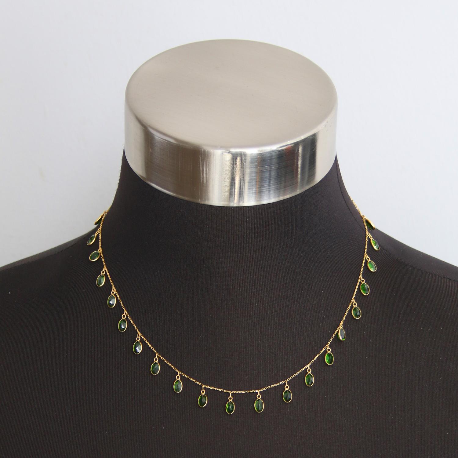 Diopside Stone and Yellow Gold Necklace - Oval cut Diopside dangle on an 18k yellow gold necklace measuring 17-18 inches long. Total sapphire weight is approx. 6.85. New with DeMesy box.