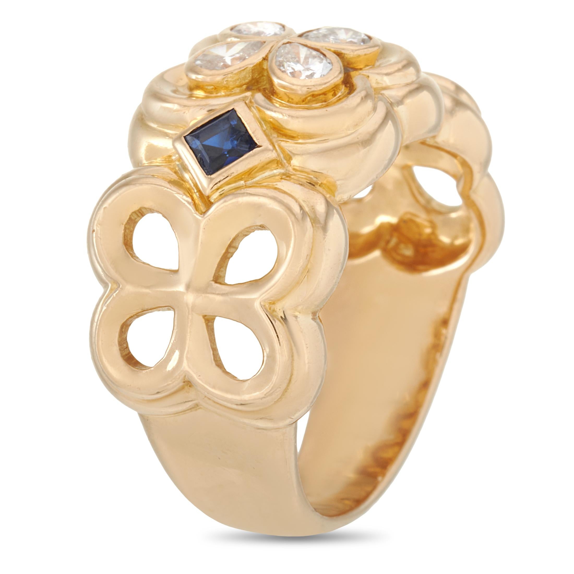 This Dior ring is crafted from 18K yellow gold and set with sapphires and a total of 0.50 carats of diamonds. The ring weighs 11.6 grams. It boasts band thickness of 5 mm and top height of 4 mm, while top dimensions measure 12 by 23 mm.
 
 The