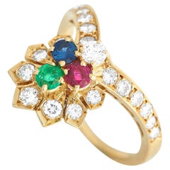 Bague Dior en or jaune 18 carats avec diamant de 0,65 carat, rubis, émeraude et saphir