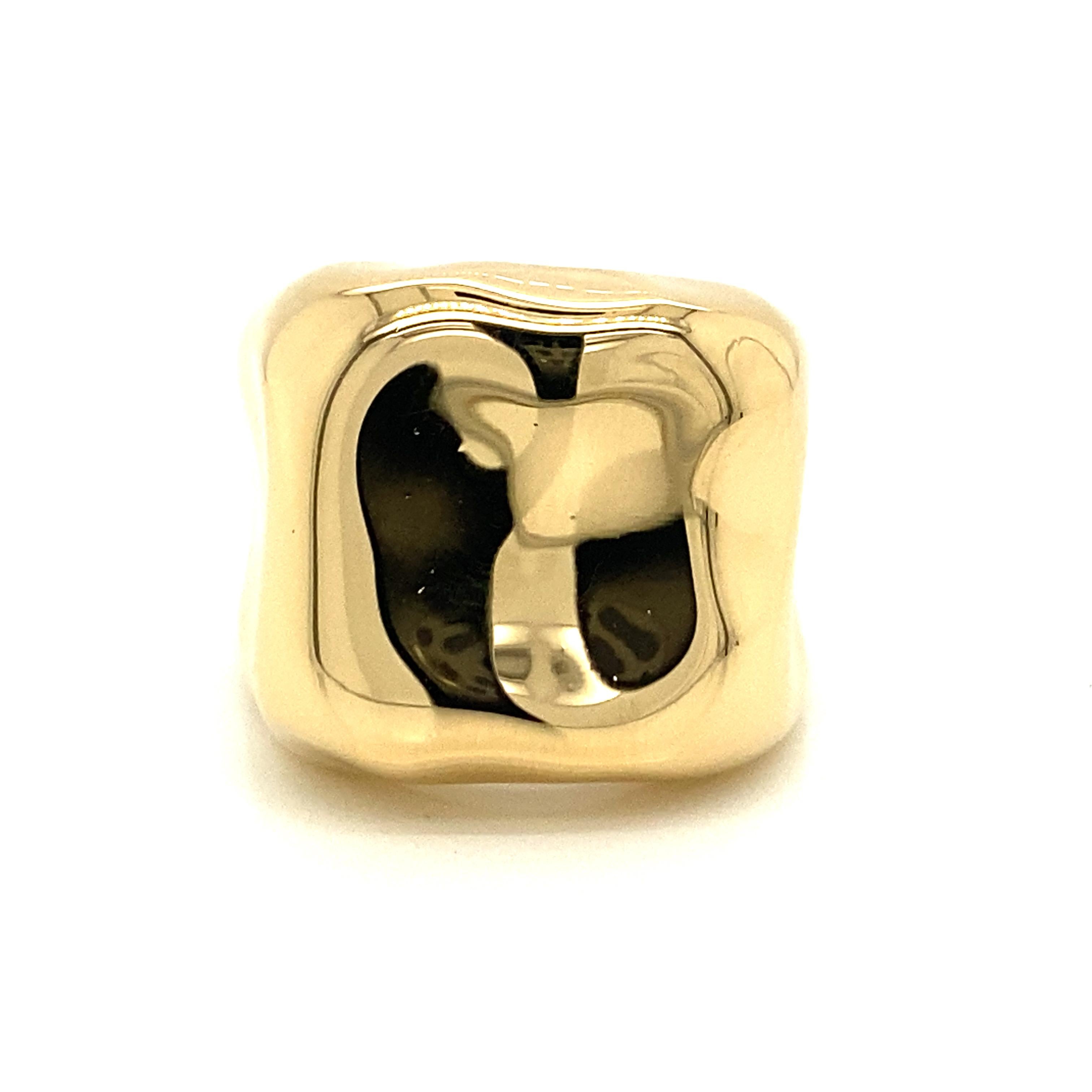 Dior Nougat Ring in 18K Yellow Gold.  The Ring measures 11/16 inch in width.  Ring size 5 1/2.  14.15 grams. Stamped: DIOR 750 B9163 49.