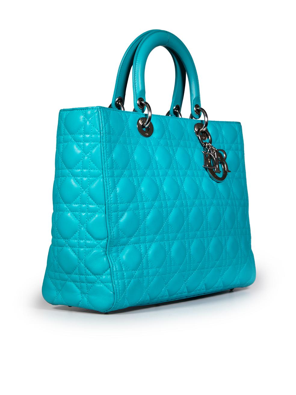 CONDITION is Very good. Minimal wear to the hand bag is evident. Scratching to the hardware across the bag. Discolouration on the left side and back upper left. Abrasion to both handles and around the central zip on this used Dior designer resale