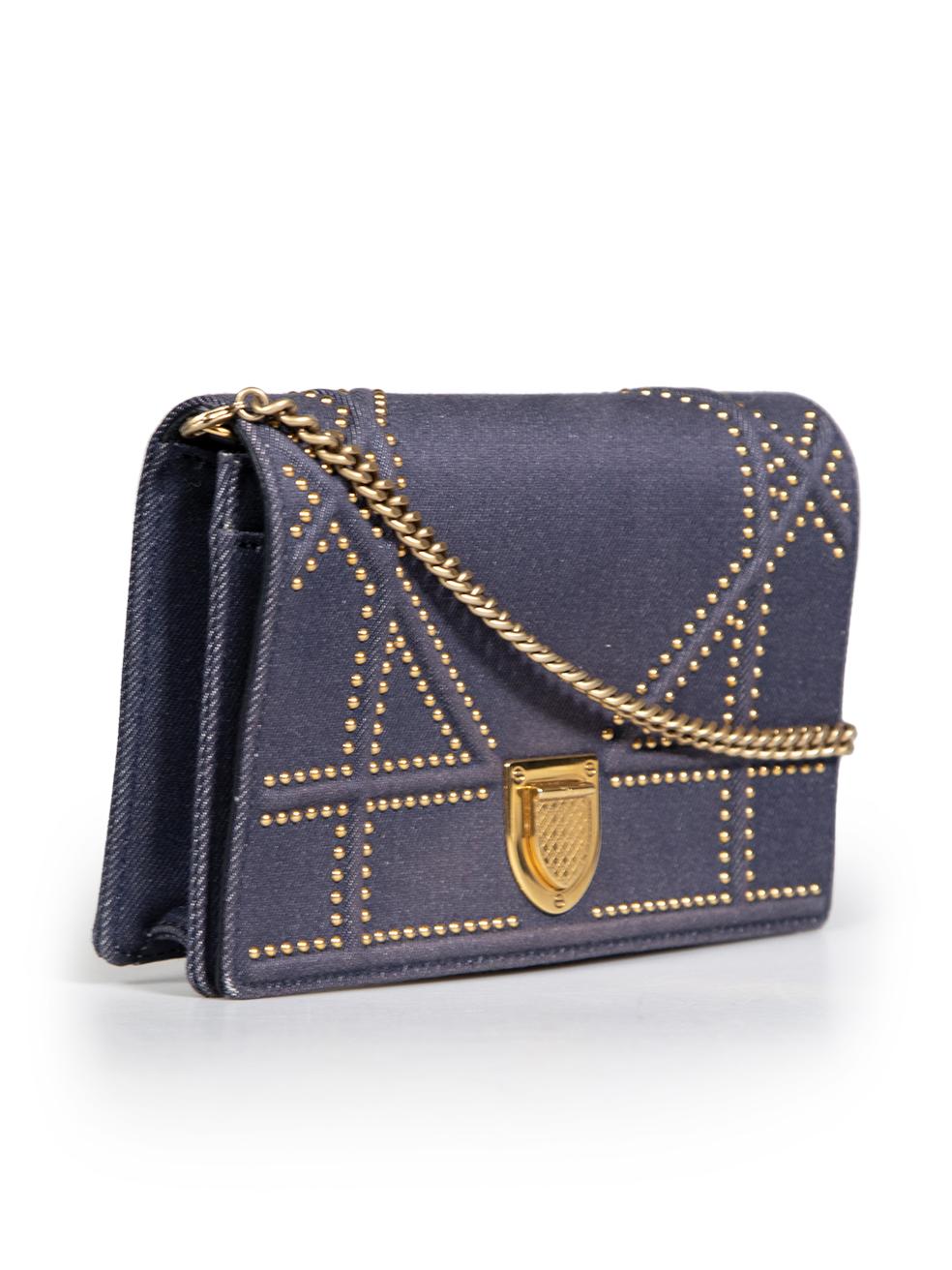 CONDITION is Very good. Minimal wear to the bag is evident. Scratching to the centre front emblem and the popper on the inside of the front flap. Abrasion to the suede on the inner side of the front flap. One small pluck to the weave on the front