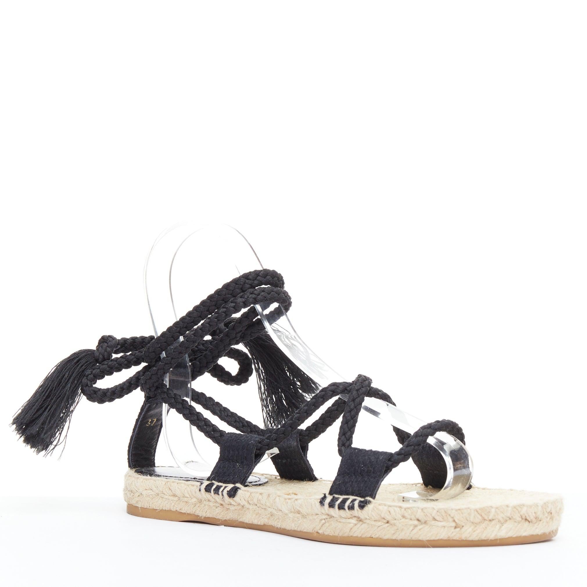DIOR 2020 Diorexpress black embroidered cotton rope tie jute sandals EU37
Reference: NKLL/A00360
Brand: Dior
Designer: Maria Grazia Chiuri
Model: Diorexpress
Collection: 2020 - Runway
Material: Cotton
Color: Nude, Black
Pattern: Solid
Closure: Lace