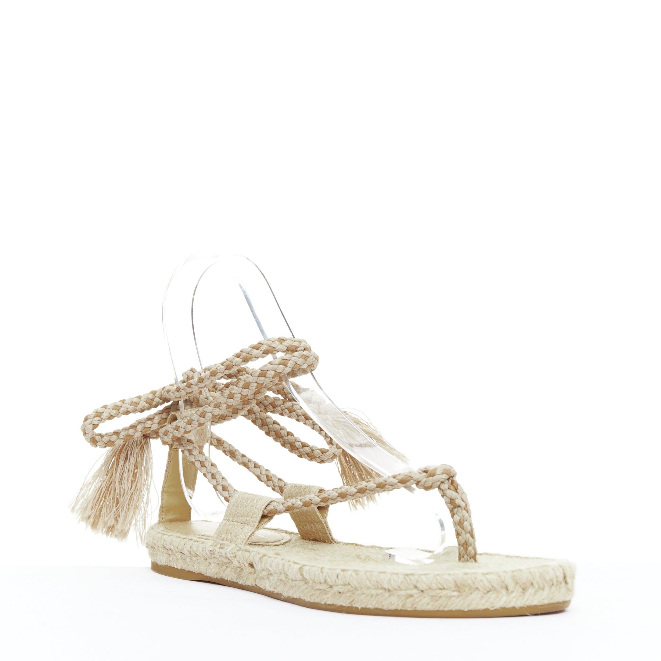 DIOR 2020 Diorexpress nude embroidered cotton rope tie jute sandals EU37
Reference: NKLL/A00359
Brand: Dior
Designer: Maria Grazia Chiuri
Model: Diorexpress
Collection: 2020
Material: Jute, Cotton
Color: Nude
Pattern: Solid
Closure: Lace Up
Lining: