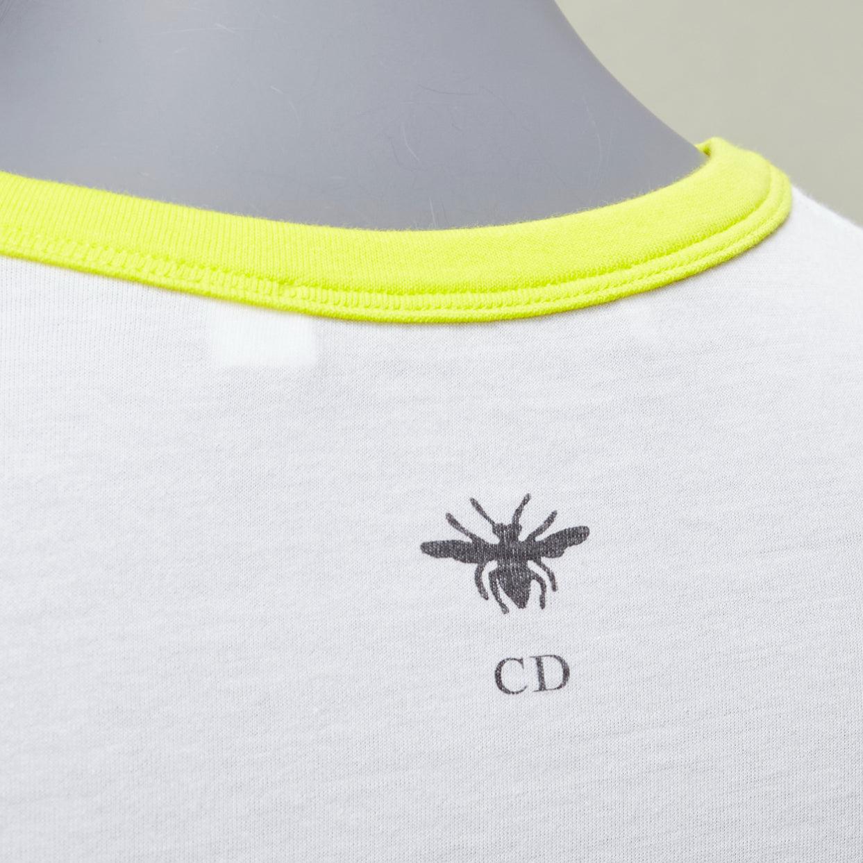 DIOR 2022 logo lion graphic print yellow cropped white cotton ringer tshirt XS
Reference: AAWC/A00776
Brand: Dior
Designer: Maria Grazia Chiuri
Model: 223T18A4499
Material: Cotton
Color: White, Yellow
Pattern: Animal Print
Closure: Pullover
Extra