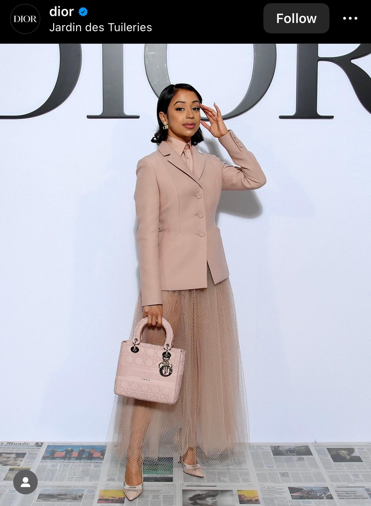 Dior's iconic Bar Jacket, originally created by Christian Dior in 1947, is reimagined in a delicate powdery pink color by Maria Grazia Chiuri. Crafted from a blend of Rose des Vents wool and silk, it features a notched collar and welt pockets,