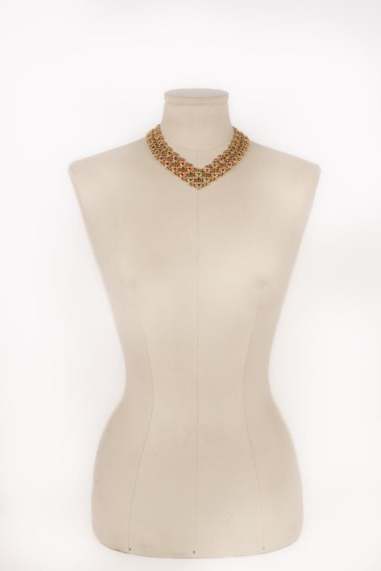 DIOR - (Made in Germany) Golden metal articulated necklace ornamented with colorful rhinestones.

Additional information:
Condition: Very good condition
Dimensions: Length: from 40 cm to 46 cm

Seller Reference: BC113
