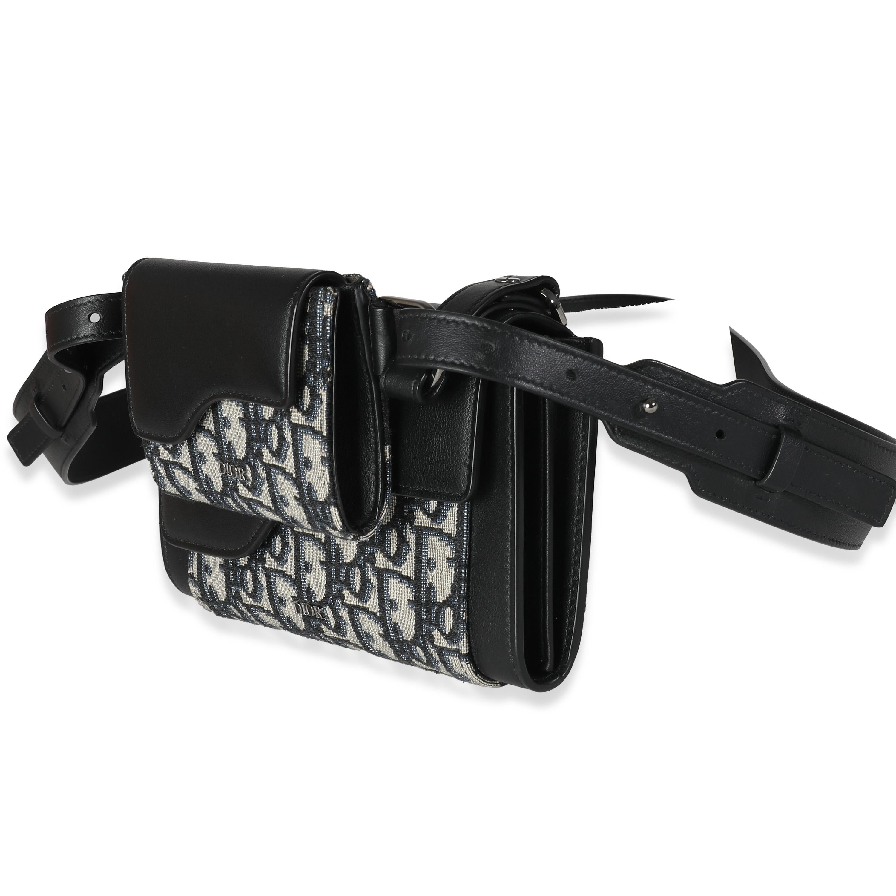 Listing Title: Dior Beige Black Oblique Canvas Elite Shoulder Pouch
SKU: 141128
Condition: Pre-owned 
Handbag Condition: Excellent
Condition Comments: Item is in excellent condition and displays light signs of wear.    Faint pressmarks along