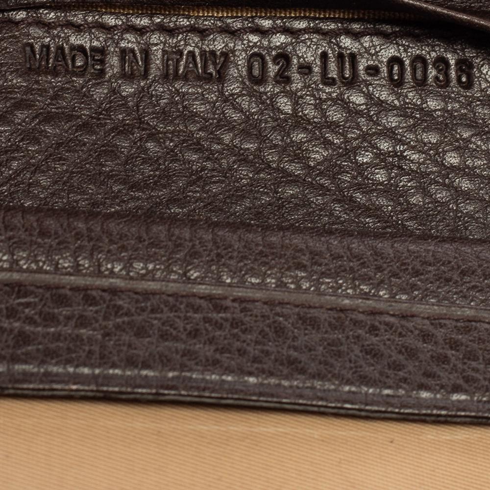 A product of high utility, this Dior wallet is covered in Oblique canvas. This Street Chic creation has multiple card compartments and the logo plaque increases its appeal. It's leather and fabric interior will keep your monetary essentials neatly