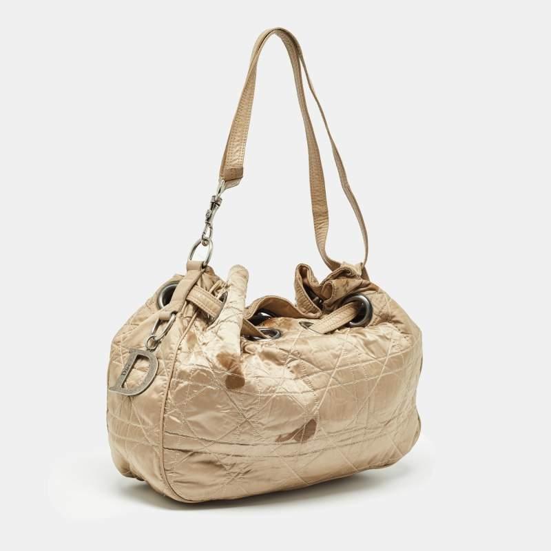 Dior Beige Cannage Nylon and Leather Drawstring Bag In Fair Condition For Sale In Dubai, Al Qouz 2