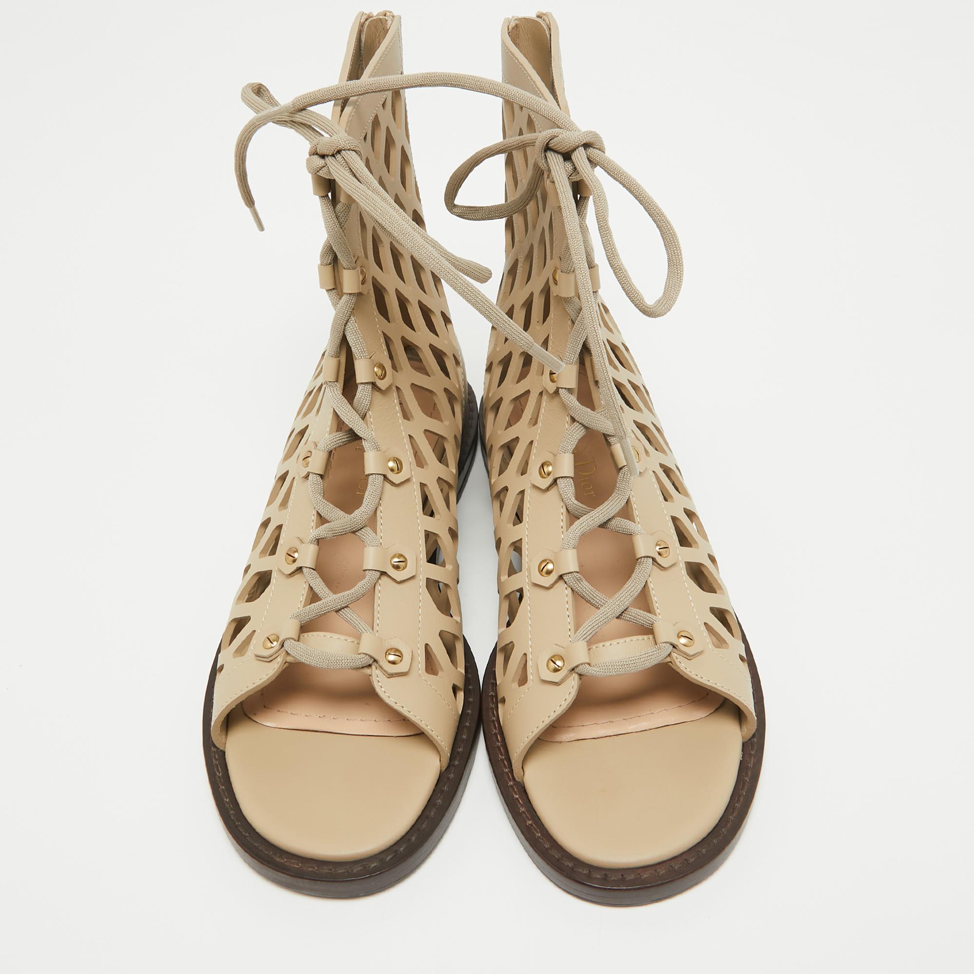 Wear these designer sandals to spruce up any outfit. They are versatile, chic, and can be easily styled. Made using quality materials, these sandals are well-built and long-lasting.

Includes: Original Box, Info Card

