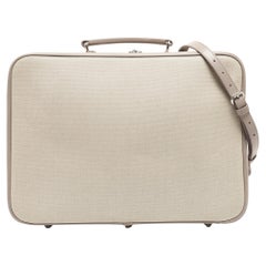 Valise à langer en cuir et toile beige/lilas Dior