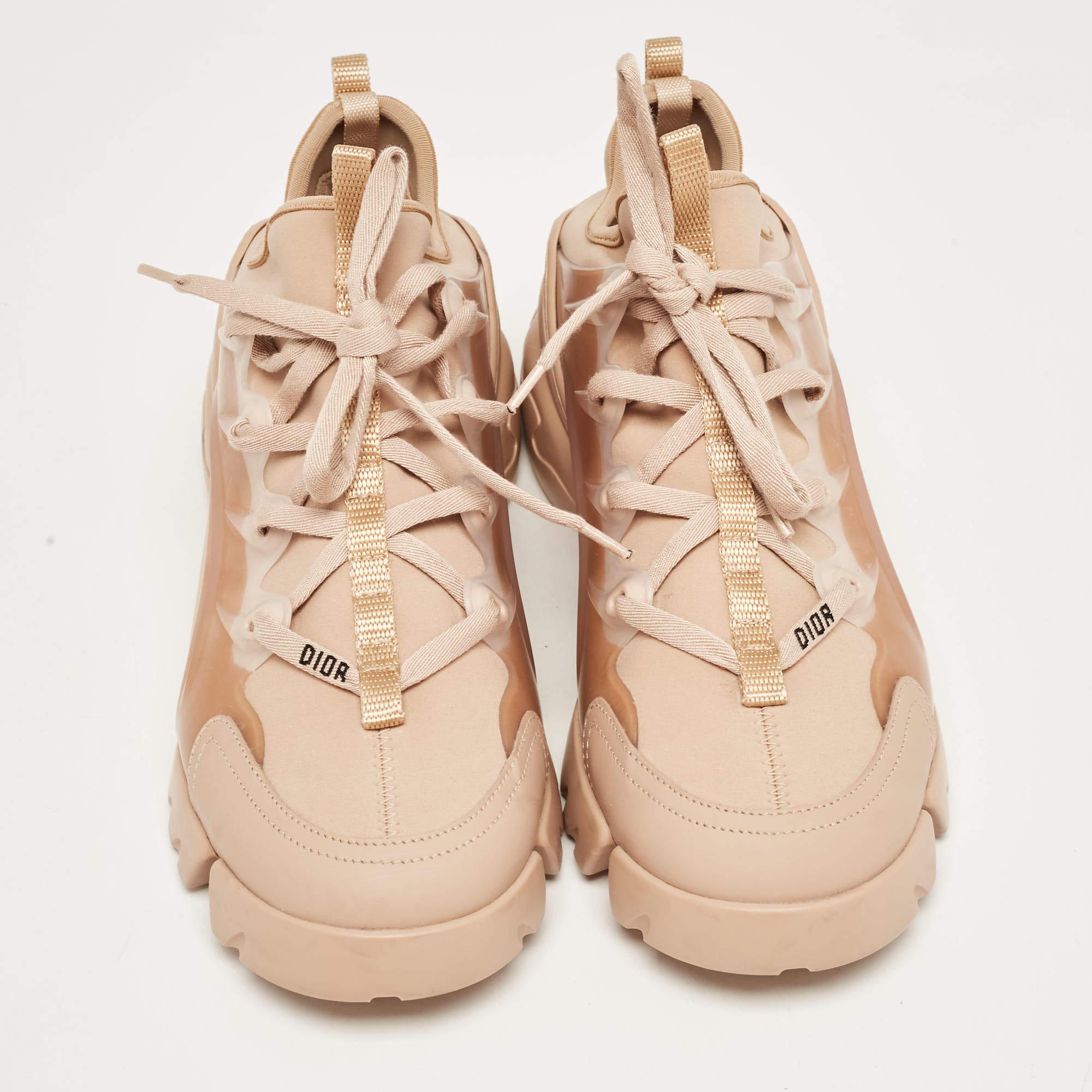 Dior's D-Connect sneaker is presented in fabric and leather, with brand details, sculpted soles, and laces for easy securing. The shoes fit well and look great.

Includes
Original Dustbag, Original Box, Extra Laces, Authenticity Card