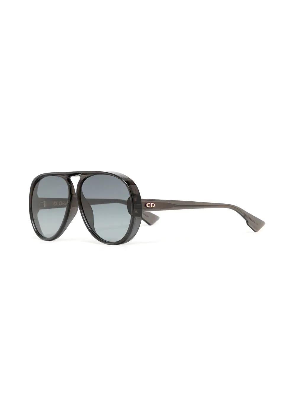The perfect face-framing accessory, these pre-owned Dior aviator sunglasses are set in black acetate frames with curving ridged edges. Finished with the brand's logo detailing at the temples, these are a must-have summer piece. They'll look