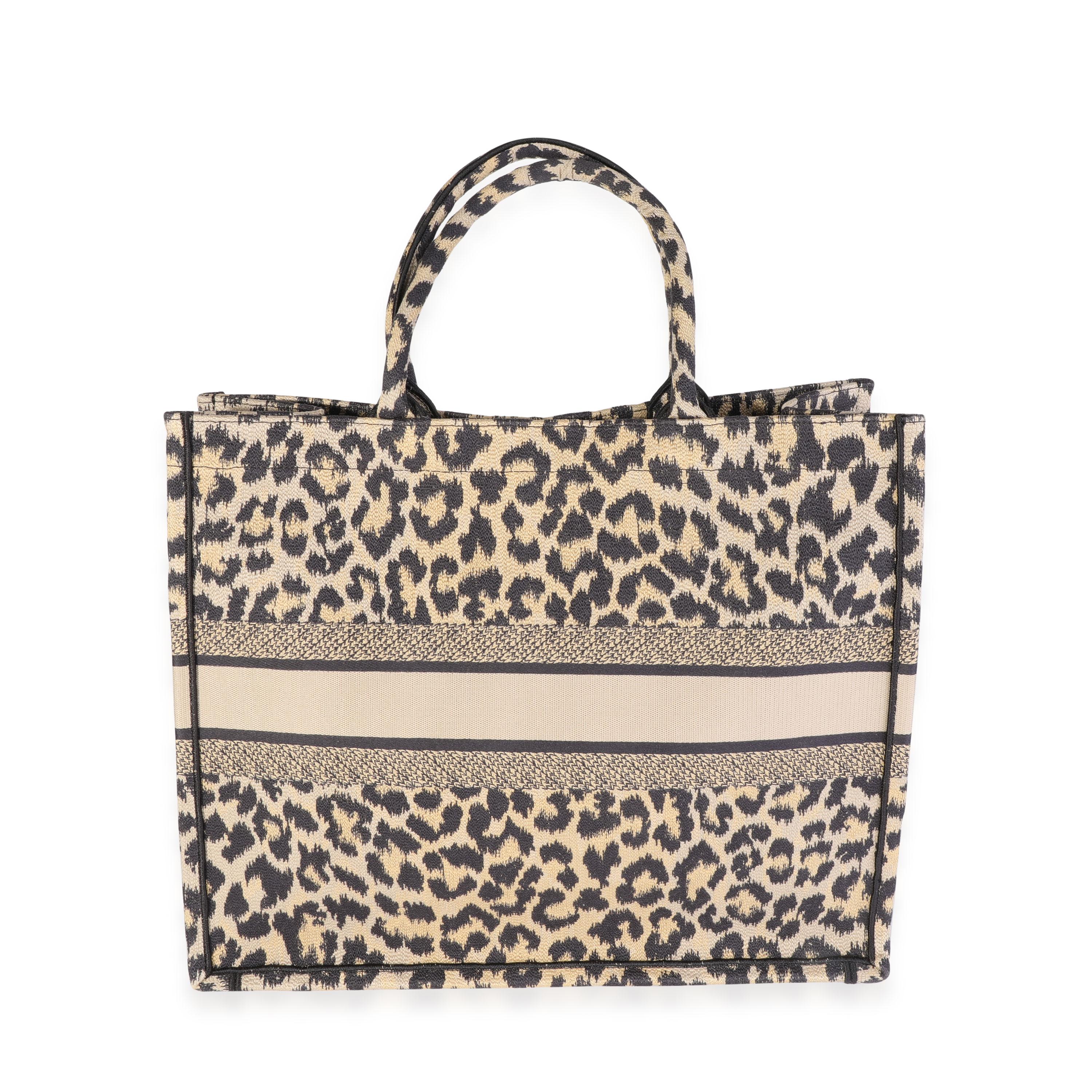 Listing Title: Dior Black & Beige Leopard Mizza Embroidery  Large Book Tote
SKU: 119887
MSRP: 3800.00
Condition: Pre-owned (3000)
Handbag Condition: Excellent
Condition Comments: Excellent Condition. No visible signs of wear.
Brand: Dior
Model: Book