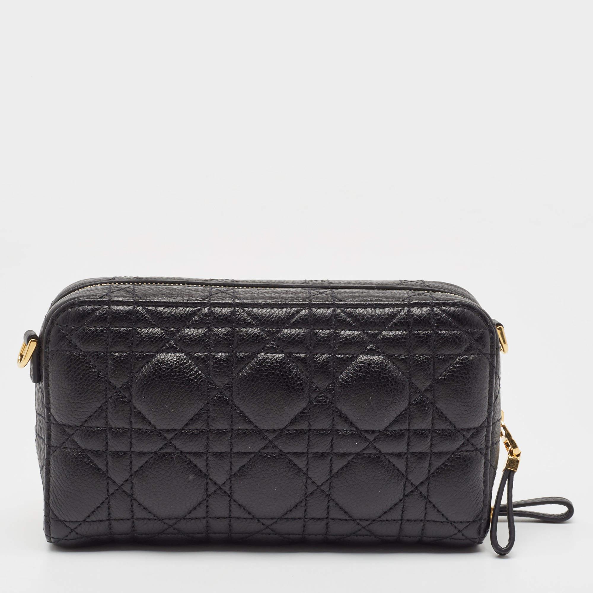Perfect for conveniently housing your essentials in one place, this Dior double pouch bag is a worthy investment. It has notable details and offers a look of luxury.

Includes: Original Dustbag, Info Card, Detachable Strap