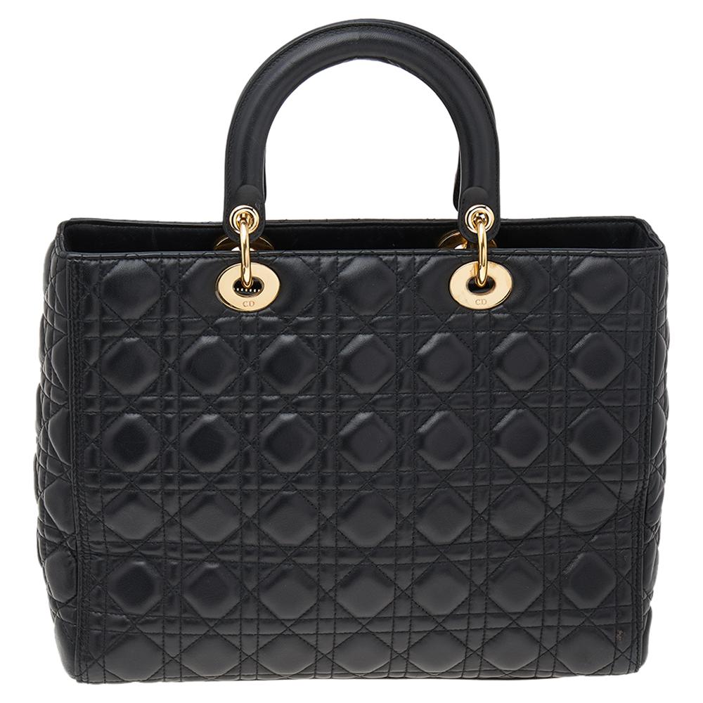 The Lady Dior tote is a Dior creation that has gained recognition worldwide and is today a coveted bag that every fashionista craves to possess. This black version has been crafted from leather and it carries the signature Cannage quilt. It is