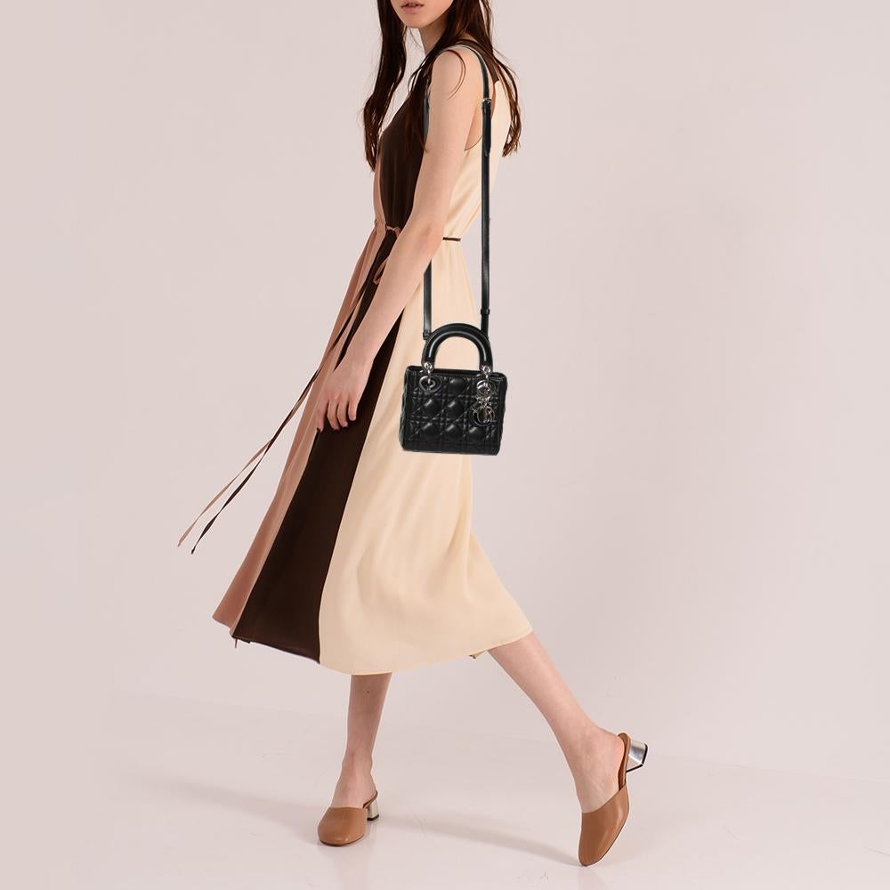 The Lady Dior tote is a Dior creation that has gained recognition worldwide and is today a coveted bag that every fashionista craves to possess. This tote has been crafted from leather and it carries the signature Cannage quilt. It is equipped with