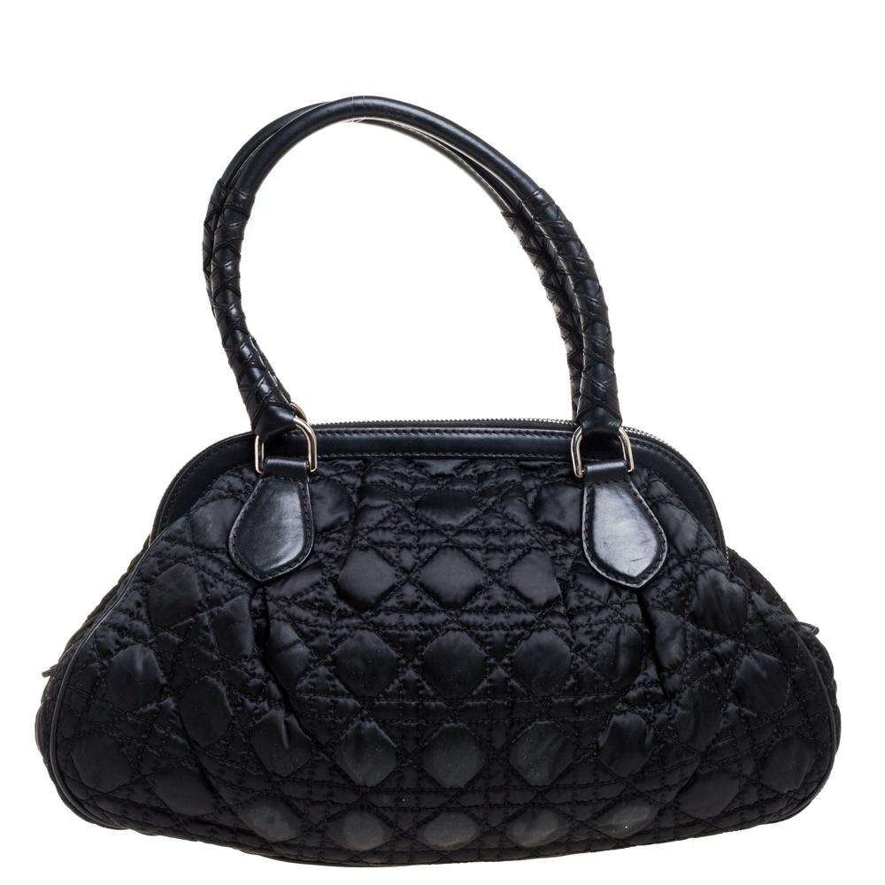 Dior’s take on the classic doctor bag, this vintage-inspired nylon and leather creation has a capacious interior to hold your daily accompaniments. It features the signature Cannage quilted pattern on the exterior and is nicely finished with dual