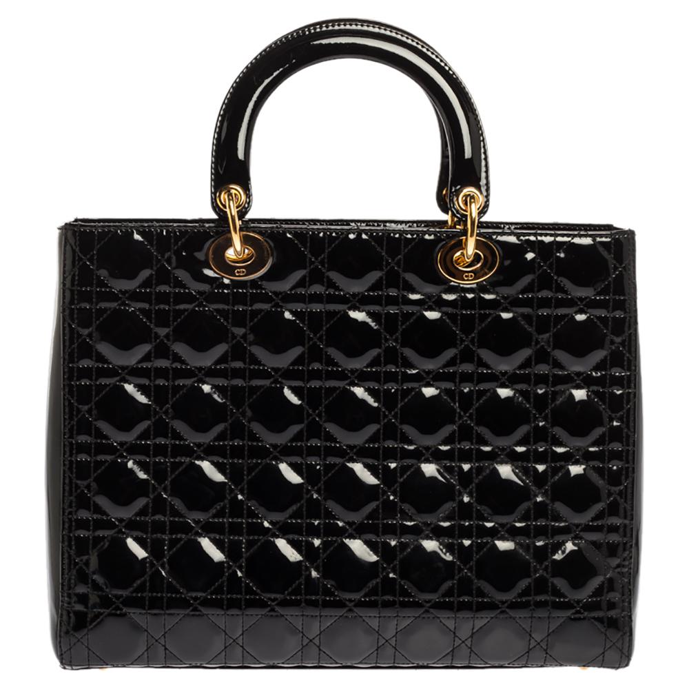 The Lady Dior tote is a Dior creation that has gained recognition worldwide and is today a coveted bag that every fashionista craves to possess. This black tote has been crafted from patent leather and it carries the signature Cannage quilt. It is