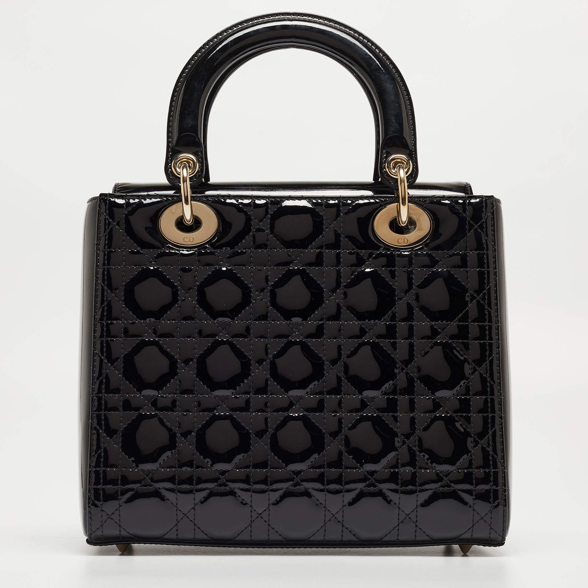 Ensure your day's essentials are in order and your outfit is complete with this Lady Dior bag. Crafted using the best materials, the bag carries the maison's signature of artful craftsmanship and enduring appeal.

Includes: Original Dustbag,