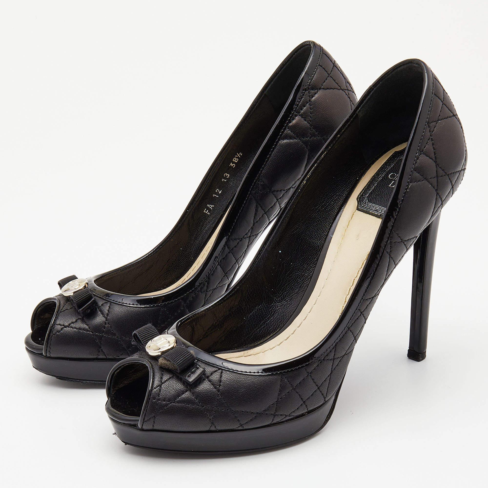 This pair of Christian Dior pumps is more than just a basic fashion statement. Crafted from Cannage quilted leather and patent leather, they feature peep toes and 'CD' logo detailed bows on the uppers. Set on 13cm heels and thin platforms, you are