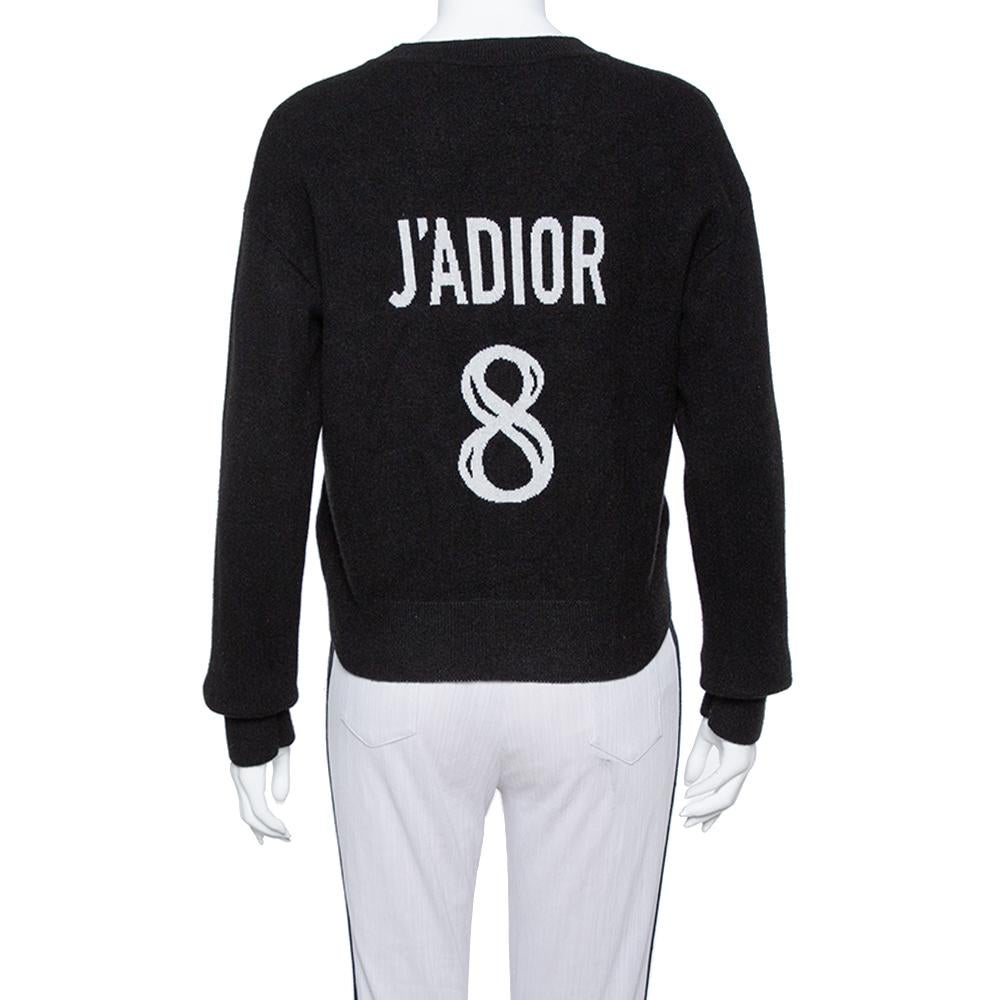Beautifully made from cashmere, this Dior sweater is designed with a crew neck, long sleeves, and 'J'ADIOR 8' detailed on the back. The black creation will surely add a fashionable touch to your wardrobe.

