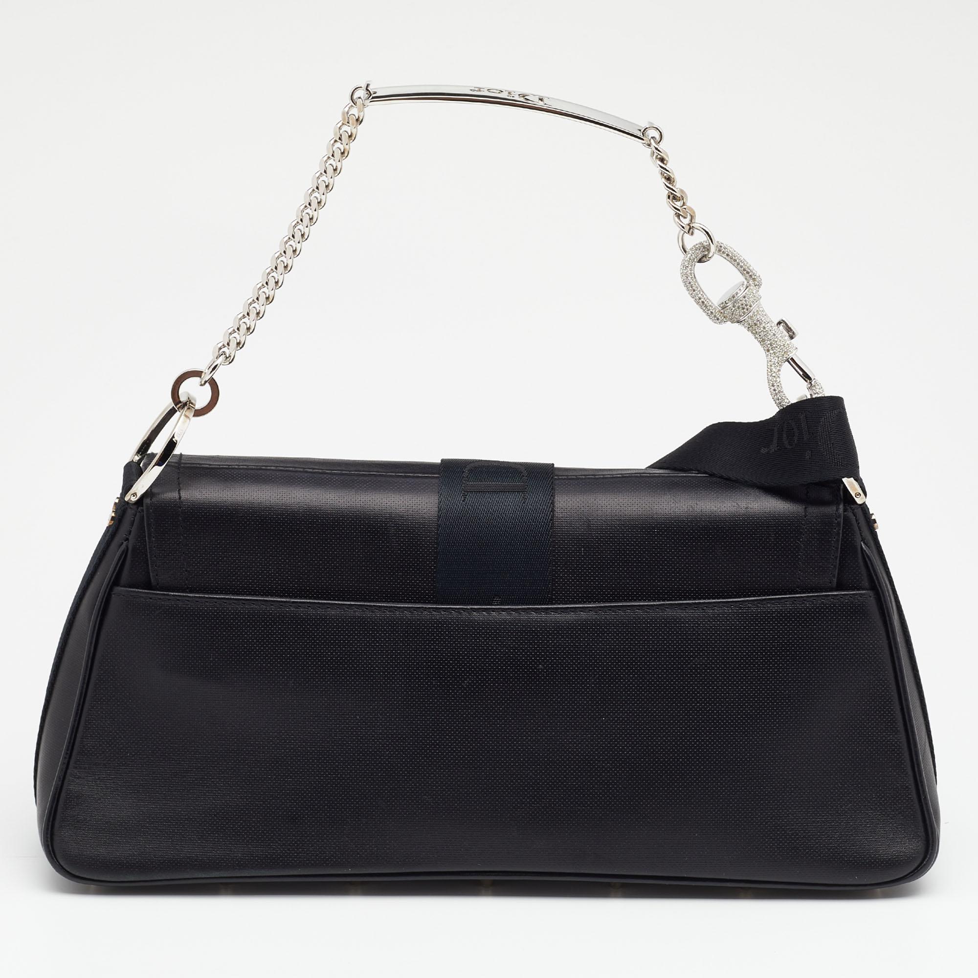 This Dior Hardcore bag is all you need to stay glamorous without going overboard. While the coated canvas body of this bag lends it a sophisticated look, the crystal-embellished latch attached to the chain link which also carries the logo plaque
