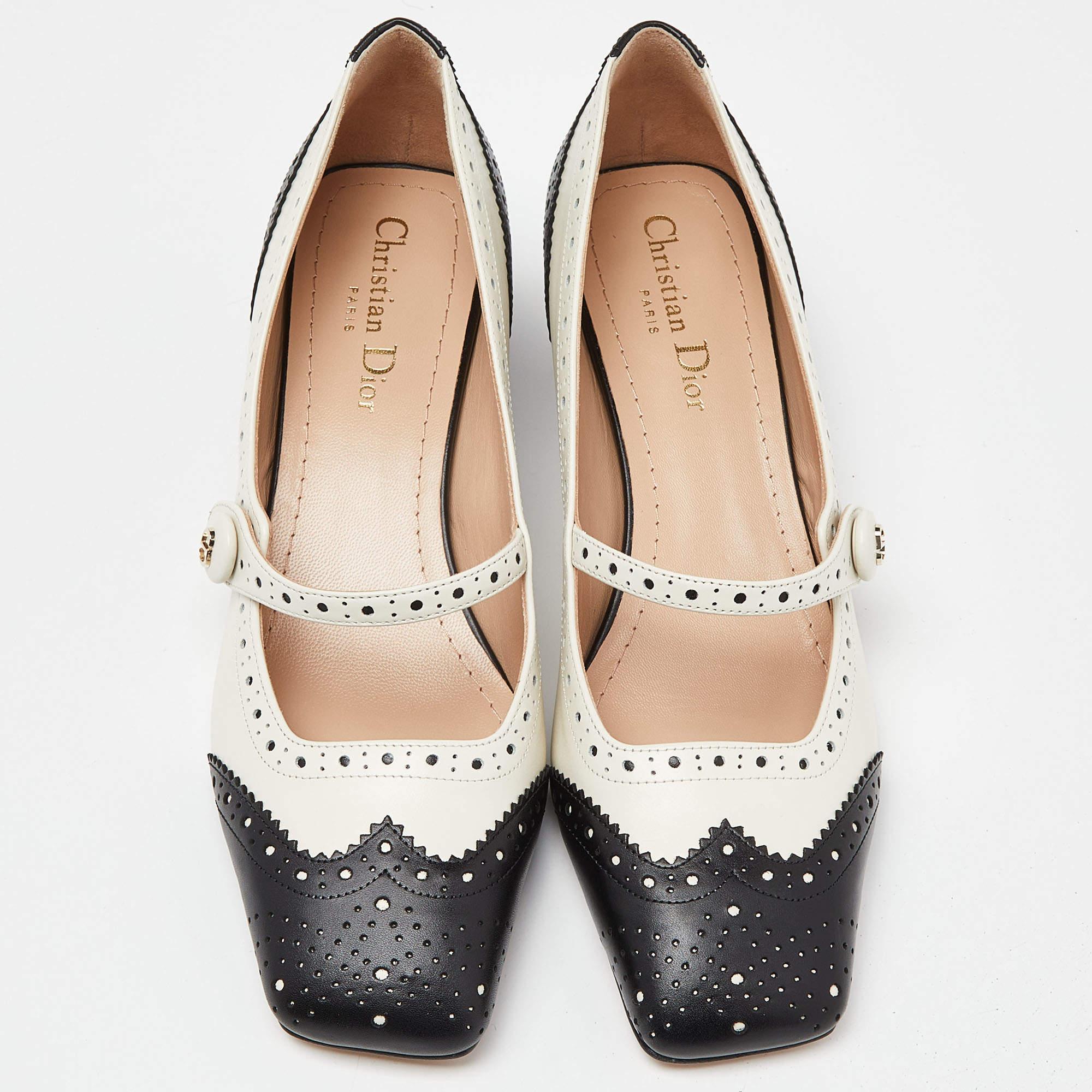 Elegant and sophisticated, the Dior pumps exude timeless charm. Crafted from luxurious leather, they boast a classic Mary Jane silhouette with a striking contrast of black and cream, epitomizing chic femininity with every step.

Includes
Original