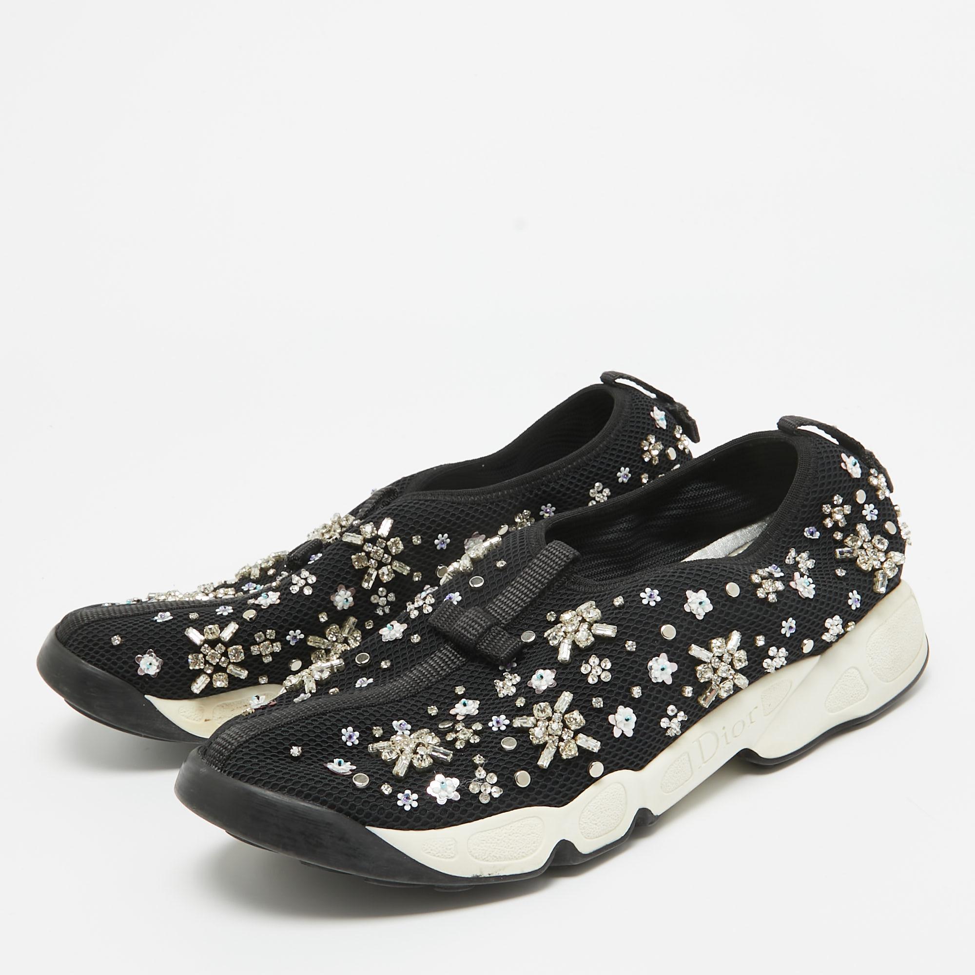Coming in a classic silhouette, these designer sneakers are a seamless combination of luxury, comfort, and style. These sneakers are finished with signature details and comfortable insoles.