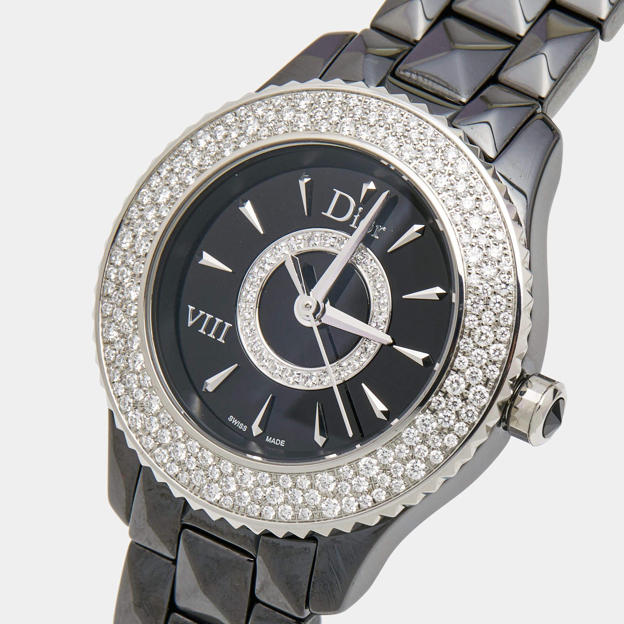 The Dior VIII CD1221E5C001 wristwatch is an exquisite timepiece measuring 28mm in diameter. It boasts a striking fusion of black ceramic and stainless steel, combining durability with elegance. The watch features Dior's signature design elements,