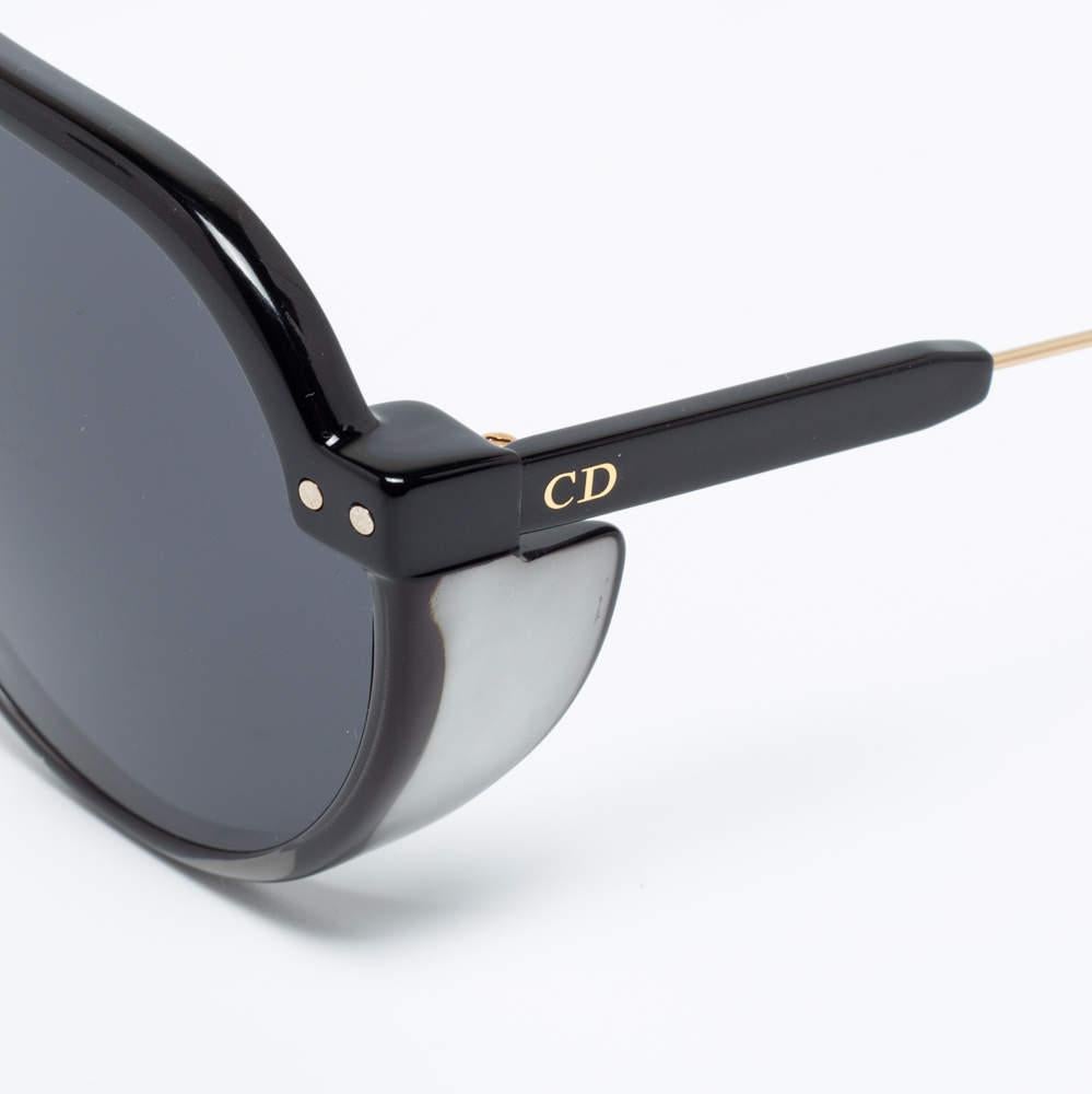 Profitez des journées ensoleillées avec style grâce à cette paire de lunettes de soleil Dior. Créées avec expertise, les lunettes de soleil de luxe sont dotées d'une monture bien conçue et de verres de haute qualité qui protègent vos yeux.