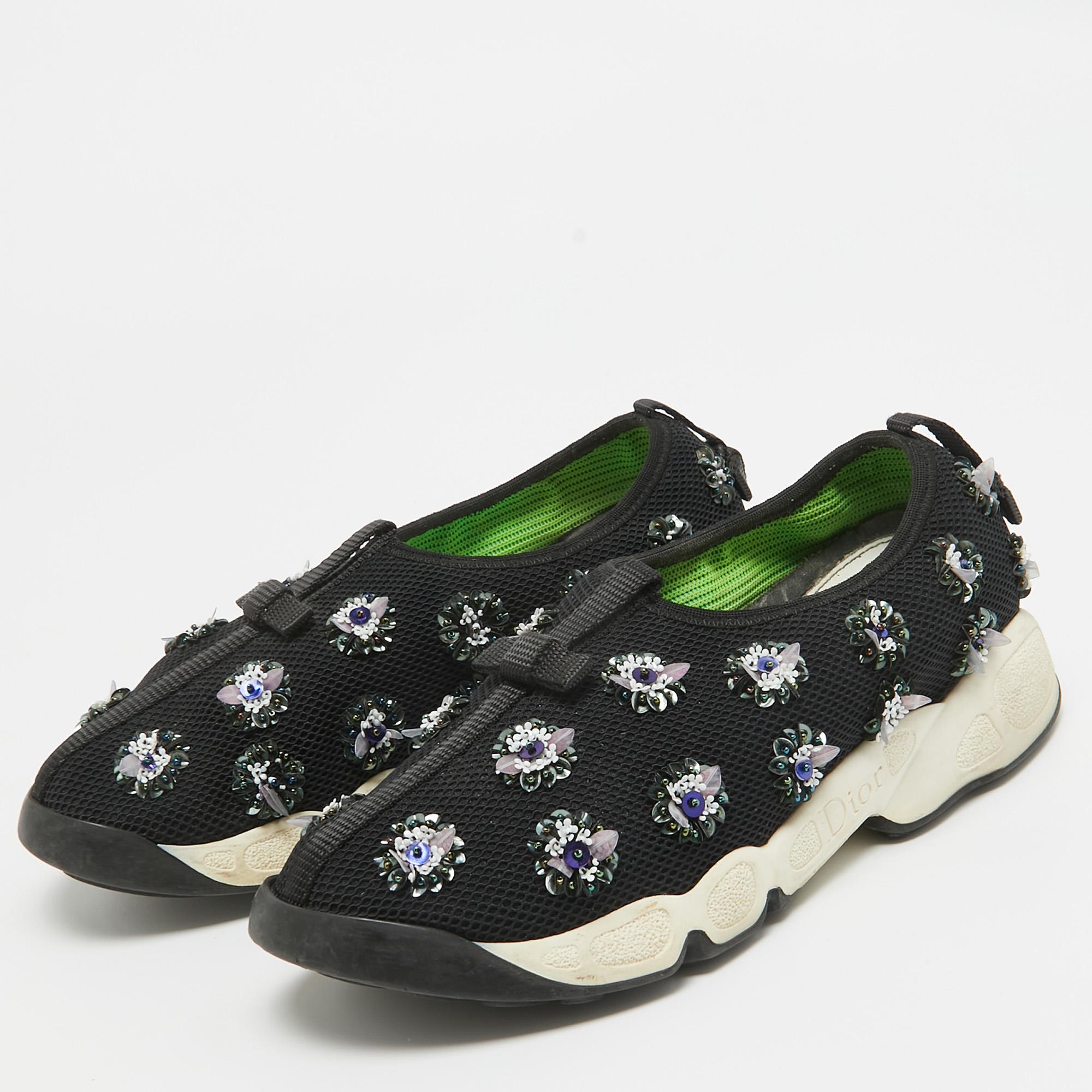 The words 'edgy' and 'ultra-modern' can be readily attributed to this pair from Dior. The sneakers were first introduced as a part of their Haute Couture Spring / Summer 2014 collection. Crafted from mesh, they feature embellishments and rubber
