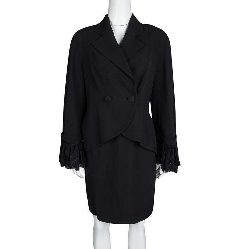 It's time you got a gorgeous blazer and skirt set and what better than this one from Dior. The set is made of the finest materials and features an elegant design. The blazer comes with front buttons, long sleeves with lace cuffs and a V cut back. A