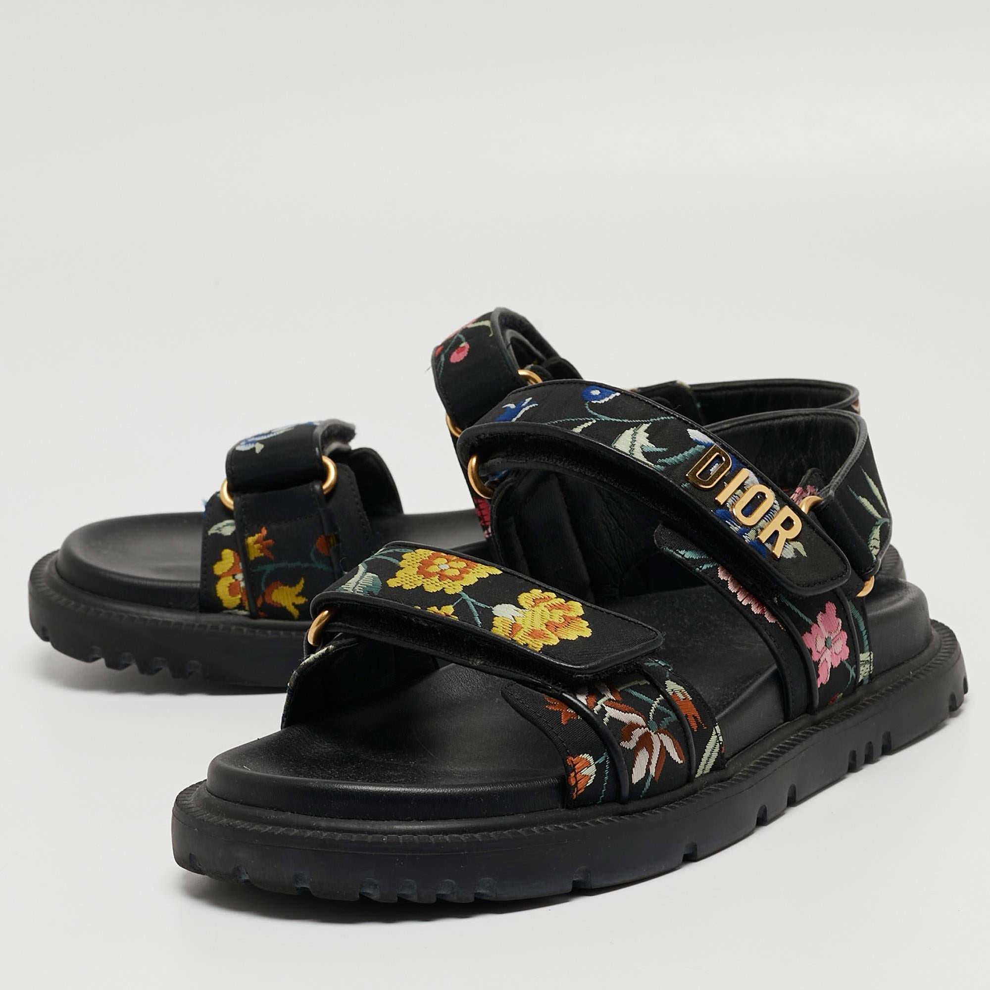 Comfortable steps are easily achieved with the leather soles of these Dior sandals. Crafted from floral-printed, they are decorated with brand detailing on the uppers and are complete with velcro straps.

Includes: Original Dustbag, Info Card,