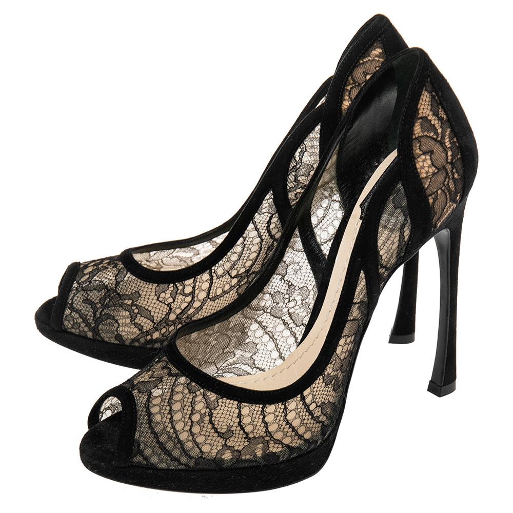 Get an elegant look with these pumps by Dior. Beautifully designed with lace, they flaunt suede trims, scallop detailing, and 12.5 cm heels. Strike the right pose by assembling the pair with a dress or jumpsuit.