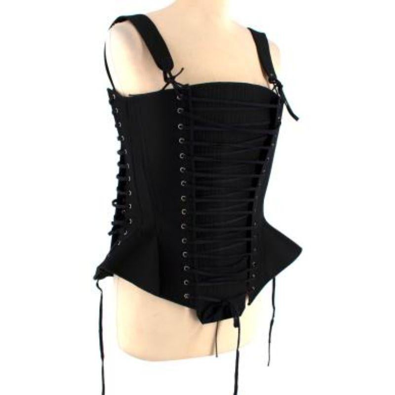 Dior Black Lace-up Corset

- Concealed zip fastening in the back
- Adjustable shoulder straps
- Adjustable lace fastening
- Form-fitting
- Structured body

Material
80% Wool and 20% Silk
Lining: 100% Silk

Dry clean only

Made in Italy

PLEASE NOTE,