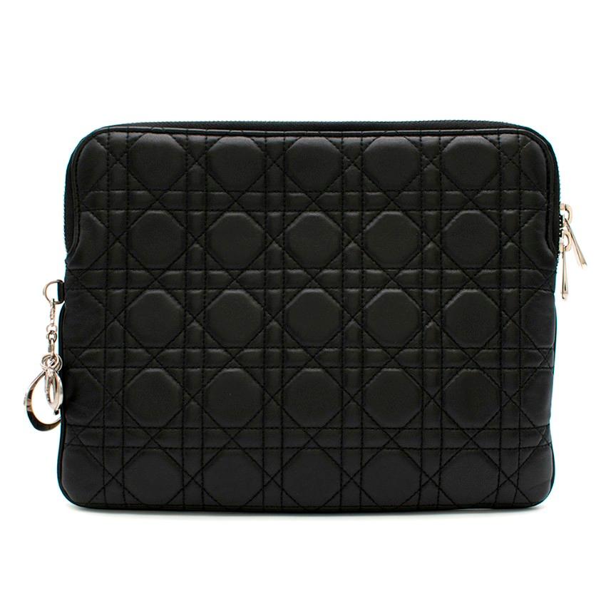 Christian Dior black quilted pouch crafted from lambskin leather. Featuring a 'Cannage' topstitching, hardware in silver-tone metal and zip fastening with Dior signature. 

- Made in Italy

Please note, these items are pre-owned and may show signs