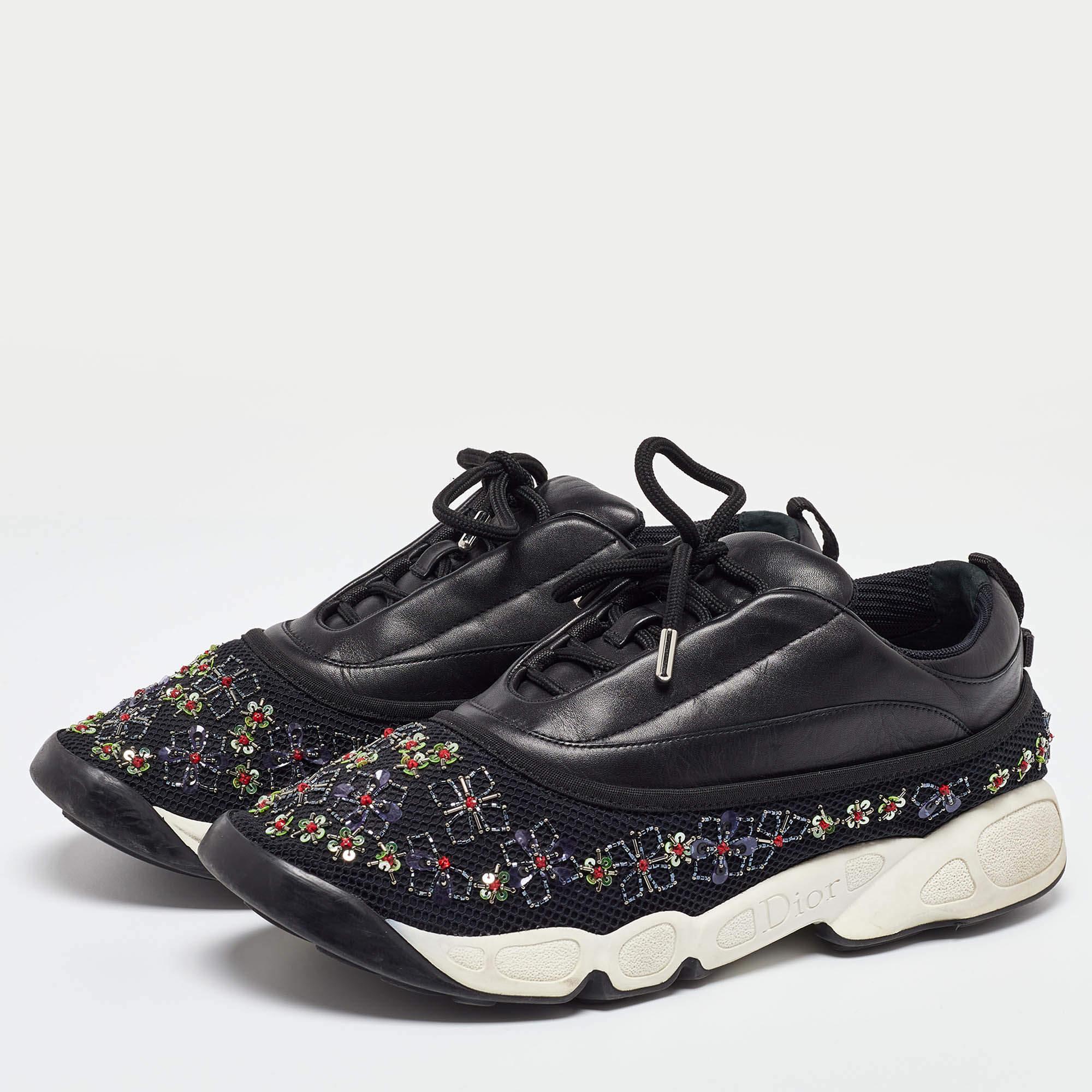 Coming in a classic silhouette these designer sneakers are a seamless combination of luxury comfort and style. These sneakers are finished with signature details and comfortable insoles.
