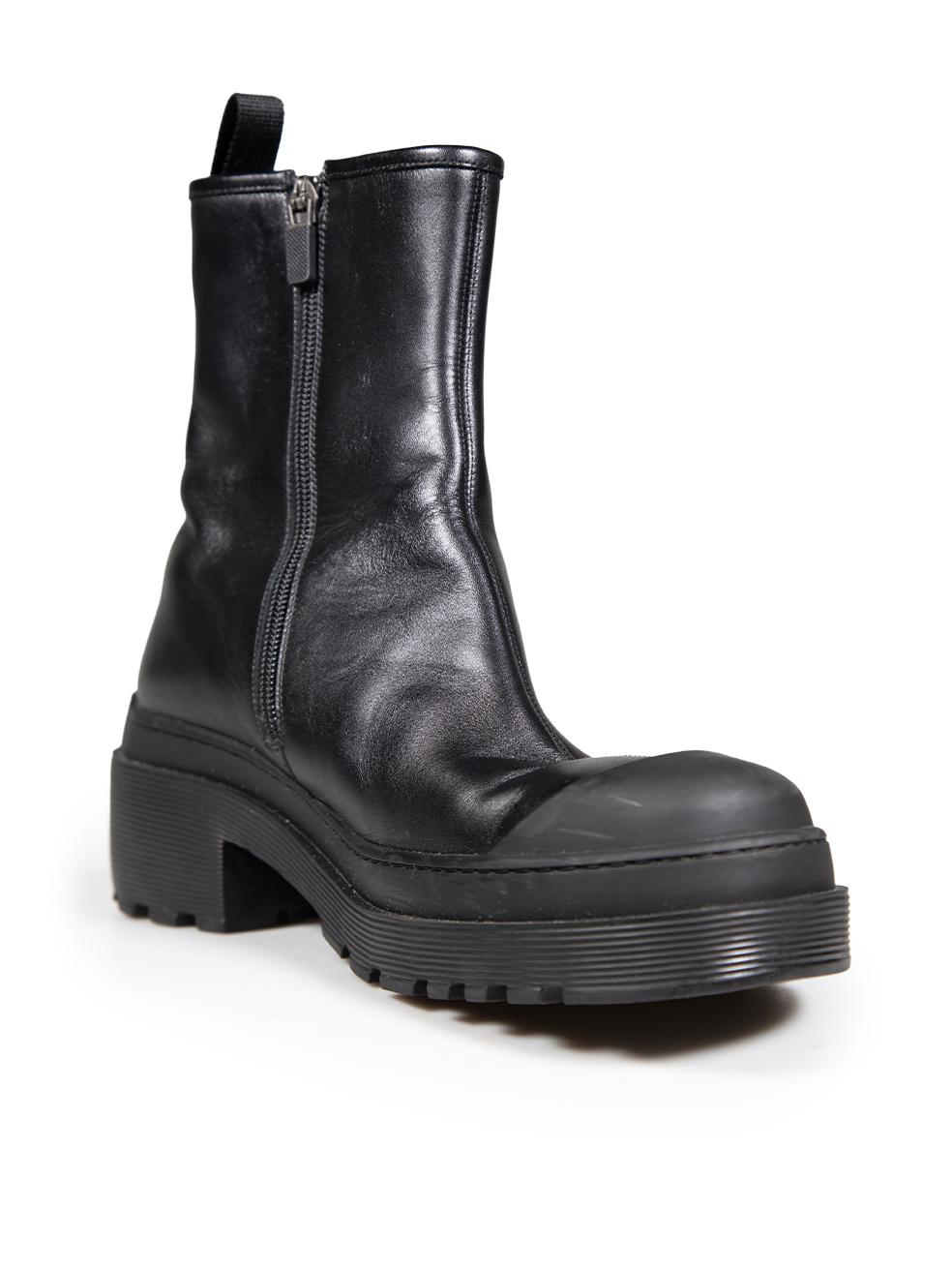 CONDITION is Very good. Minimal wear to the boots is evident. Abrasion to the toe cap and front rim of the sole on both shoes of this used Dior designer resale item.
 
 
 
 Details
 
 
 Black
 
 Leather
 
 Boots
 
 Ankle
 
 Side zip fastening
 

