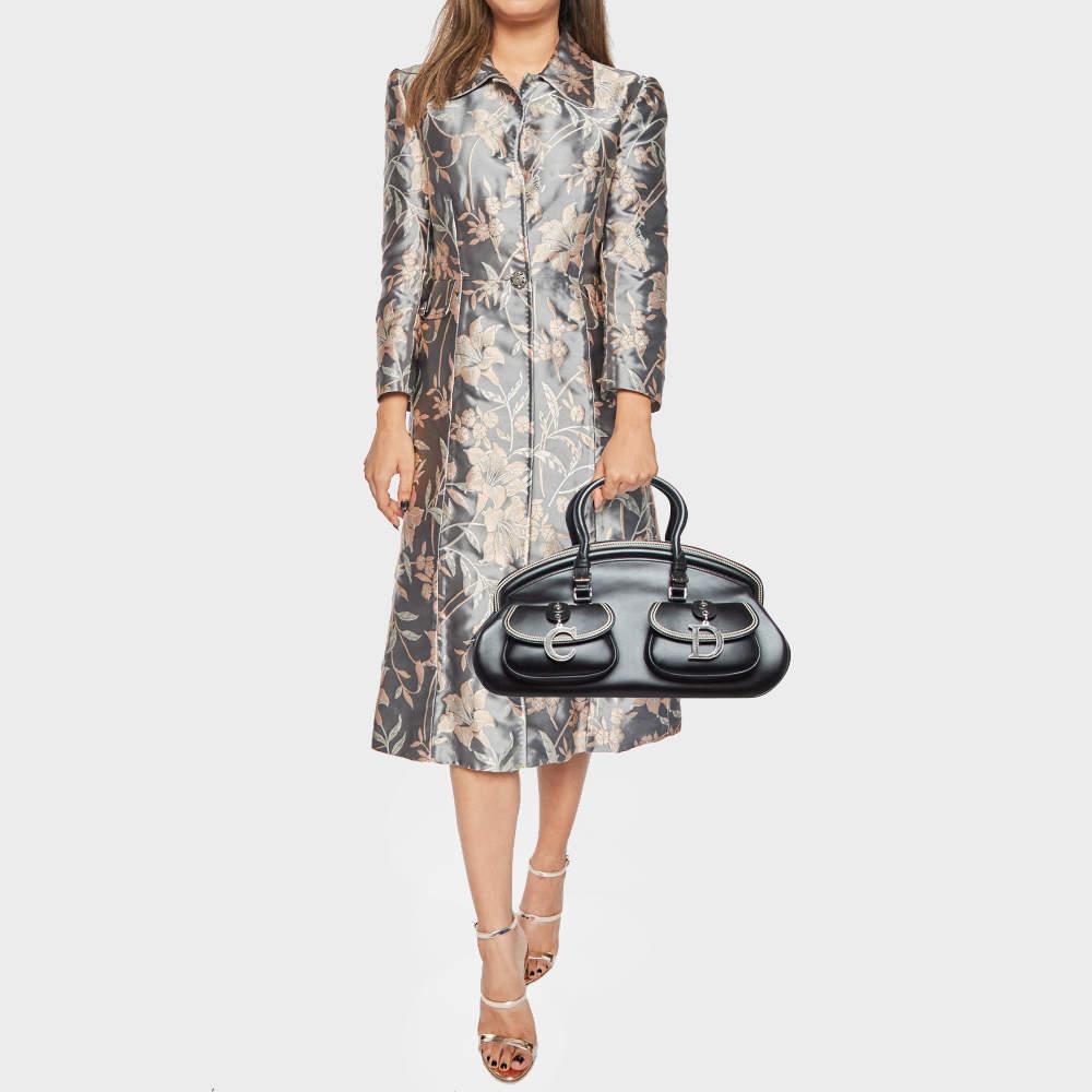 This satchel is built to hold your essentials in the most fashionable way Easy to style well made using best materials and coming from the top brand the satchel will add immense style to your ensemble.