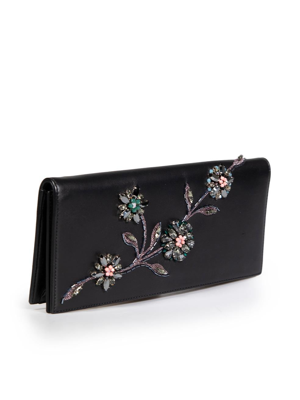 CONDITION is Very good. Minimal wear to clutch is evident. There are small scratches to the front, back and inside flap, and metal magnetic hardware on this used Dior designer resale item.
 
 
 
 Details
 
 
 Black
 
 Leather
 
 Medium clutch bag
 
