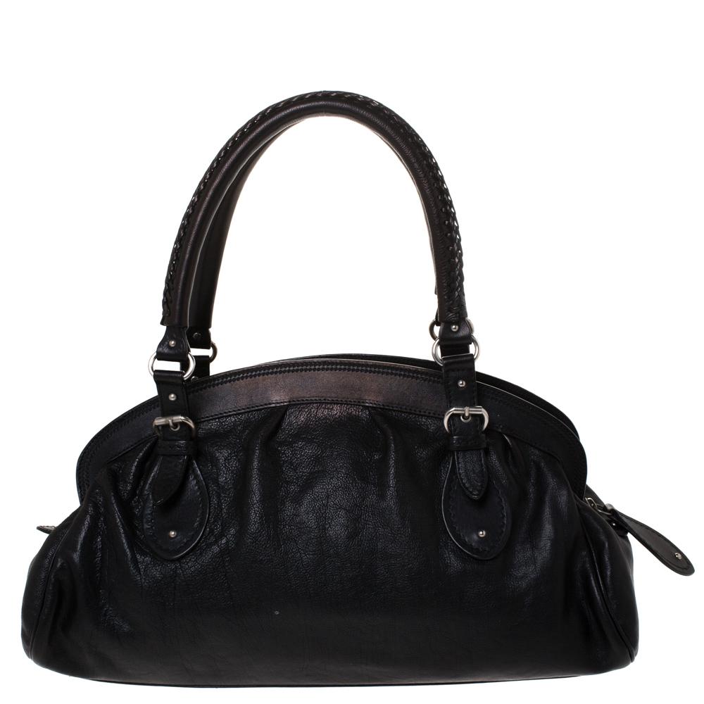 This gorgeous creation by Dior will surely meet all your fashion expectations. The My Dior satchel has a lovely silhouette and chic appeal that can be owed to the label's excellent craftsmanship and creative flair. It is crafted with black leather
