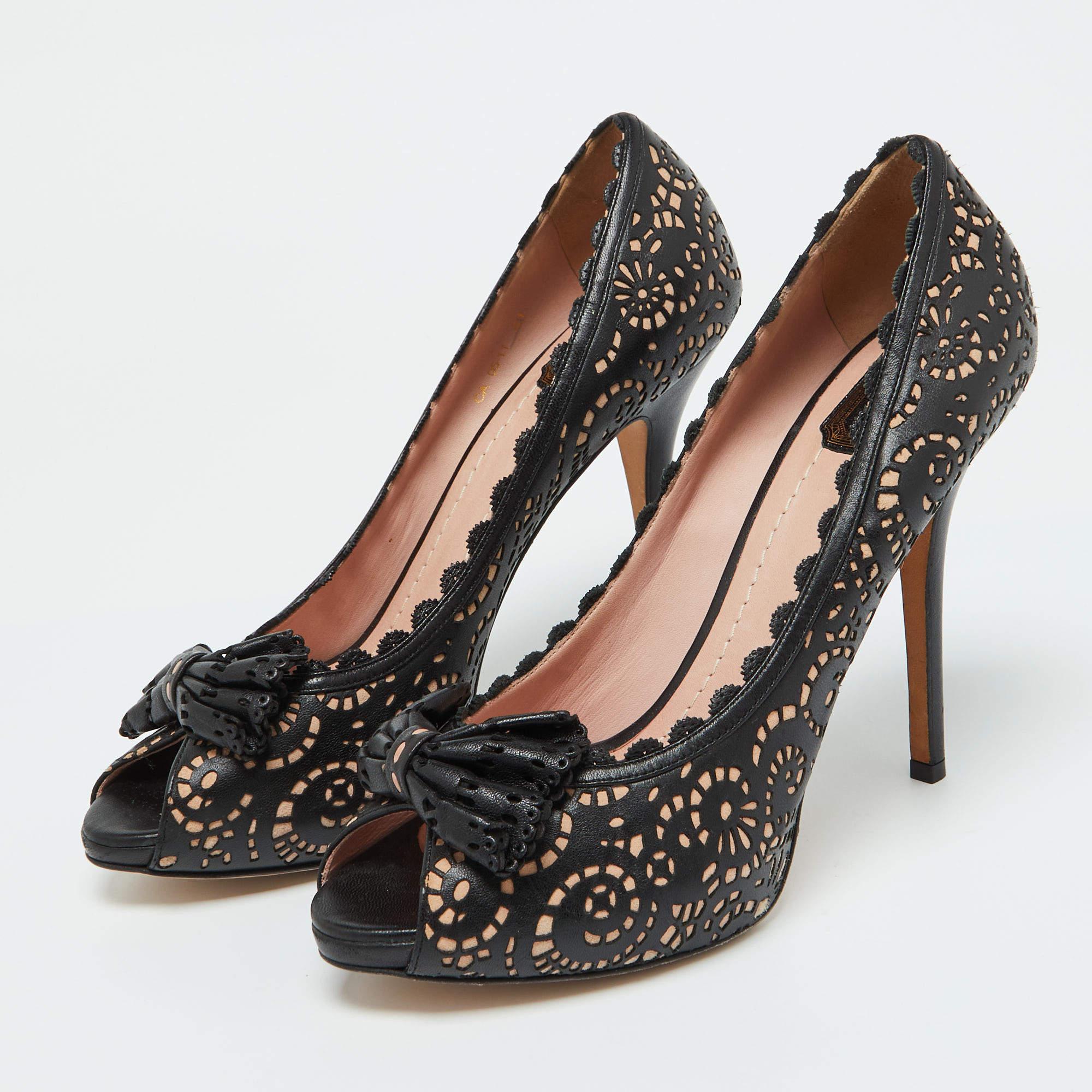 Make a chic style statement with these designer pumps. They showcase sturdy heels and durable soles perfect for your fashionable outings