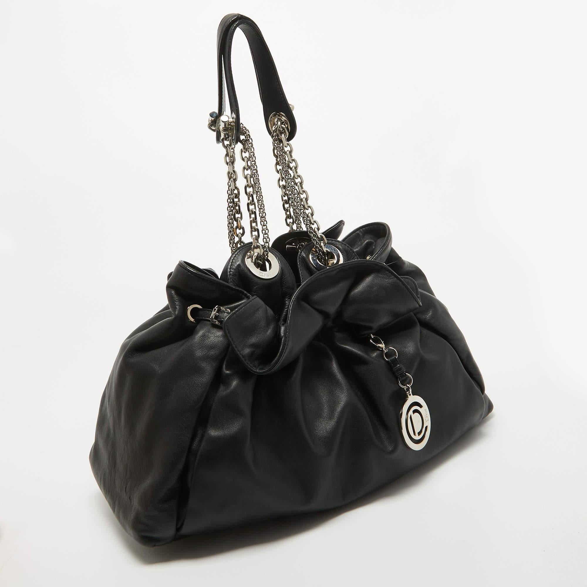 Stylish handbags never fail to make a fashionable impression. Make this designer Dior hobo yours by pairing it with your sophisticated workwear as well as chic casual looks.

