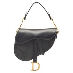 Dior Schwarze Mini-Satteltasche aus Leder