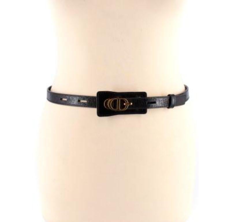 Dior Black Leather Belt with Gold Logo Buckle

- Shiny black leather belt with golden logo clasp
- Thin width with slot and hook closure 
- Leather panel with clasp 

Made in Italy 

9.5/10 excellent condition with no signs of wear


PLEASE NOTE,