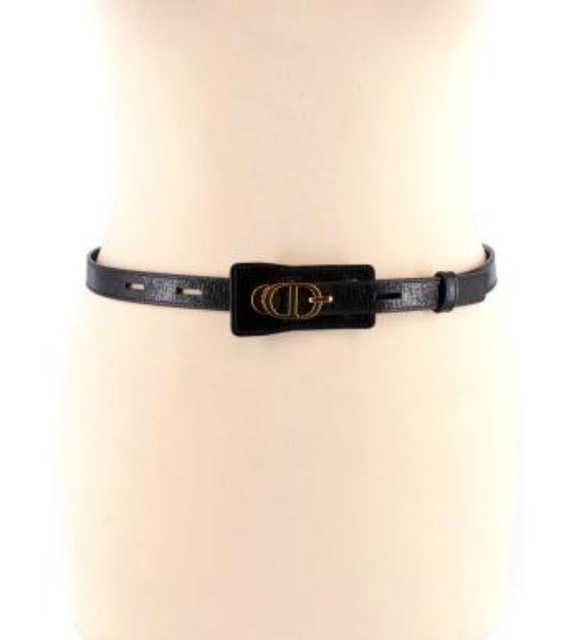 Dior Black Leather Belt with Gold Logo Buckle

- Shiny black leather belt with golden logo clasp
- Thin width with slot and hook closure 
- Leather panel with clasp 

Made in Italy 

9.5/10 excellent condition with no signs of wear


PLEASE NOTE,