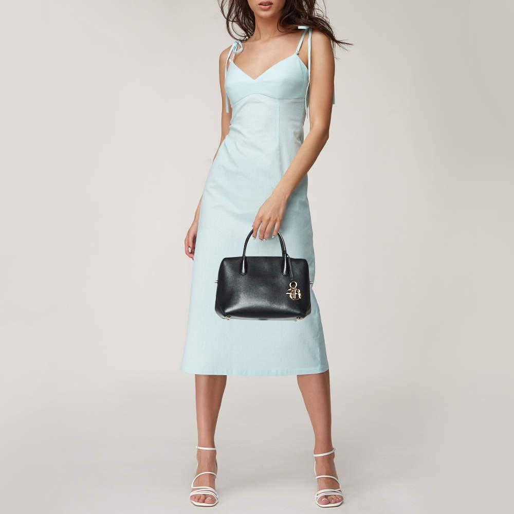 This alluring tote bag for women has been designed to assist you on any day. Convenient to carry and fashionably designed  the tote is cut with skill and sewn into a great shape. It is well equipped to be a reliable accessory.