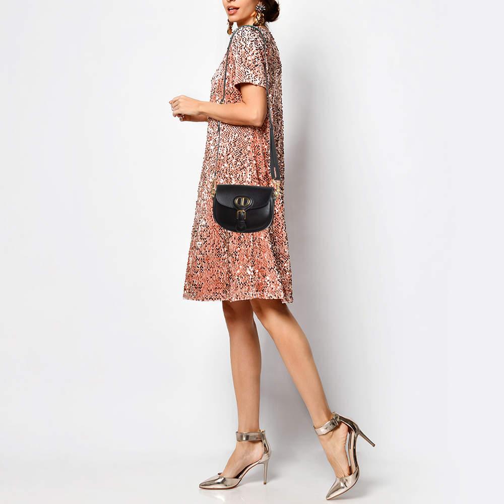 Designer bags are ideal companions for ample occasions Here we have a fashion meets functionality piece crafted with precision. It has been equipped with a well sized interior that can easily fit all your essentials.